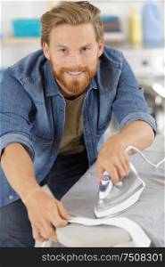 picture of man ironing