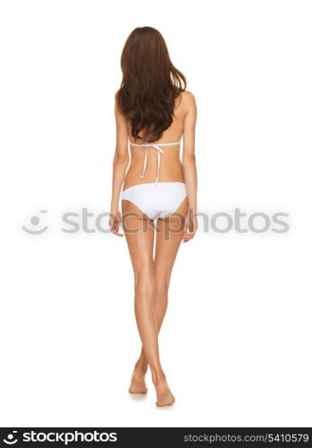 picture of model posing in white bikini.