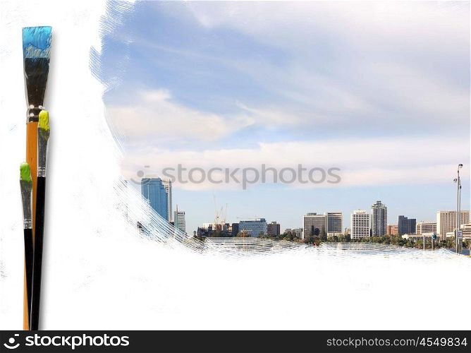 Picture of modern city landscape and brushes