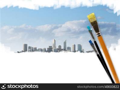 Picture of modern city landscape and brushes