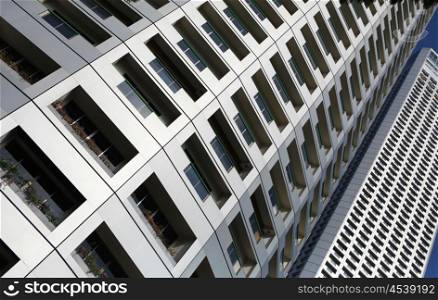 picture of modern multistory building made of glass and concrete