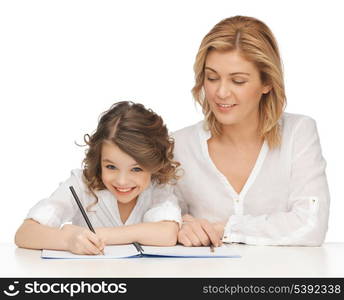 picture of mother and daughter doing home work