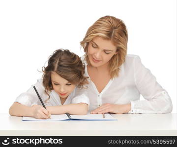 picture of mother and daughter doing home work