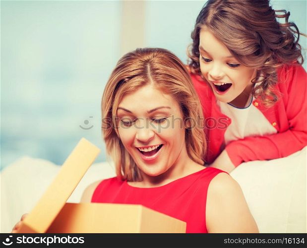 picture of mother and daughter with box