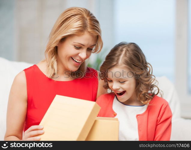 picture of mother and daughter with box