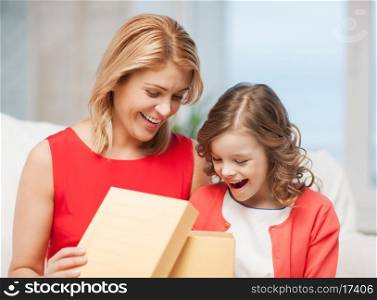 picture of mother and daughter with box