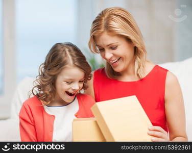 picture of mother and daughter with box