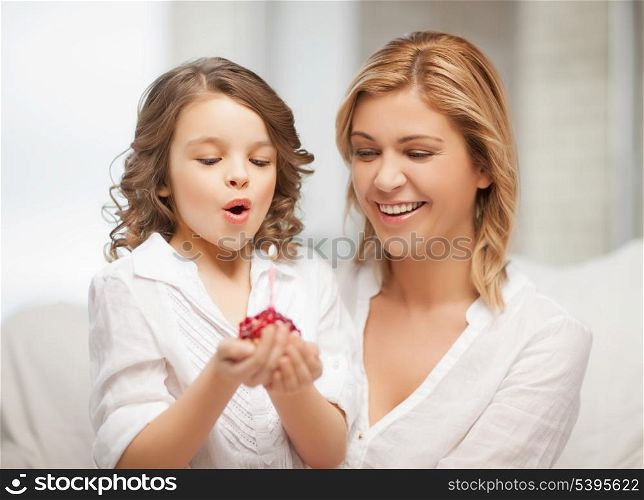 picture of mother and daughter with cupcake