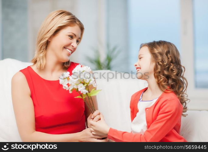 picture of mother and daughter with flowers