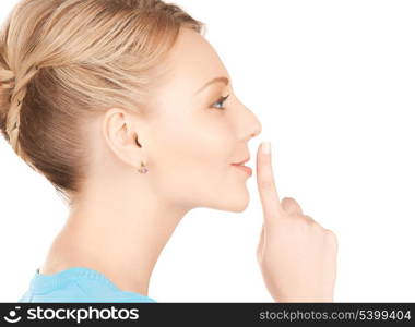 picture of mysterious woman with finger on her lips