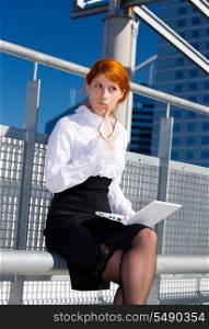 picture of pensive businesswoman in the city