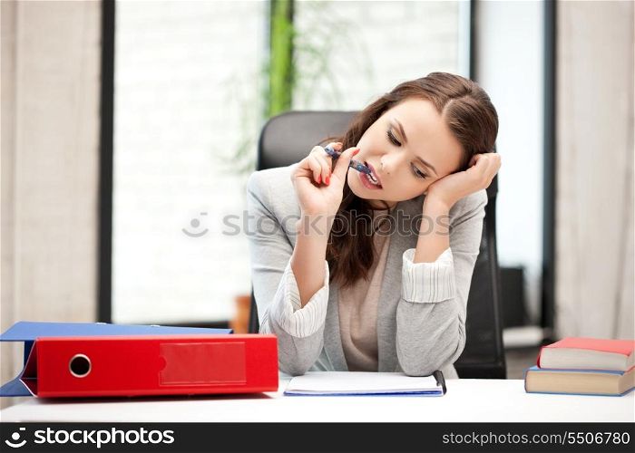 picture of pensive woman with big notepad