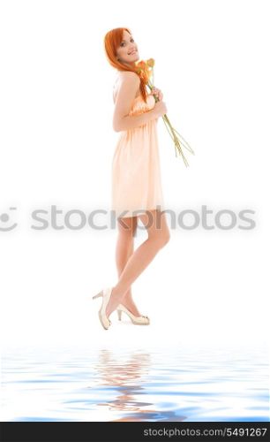 picture of redhead woman with flowers over white