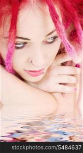 picture of sad pink hair girl in water