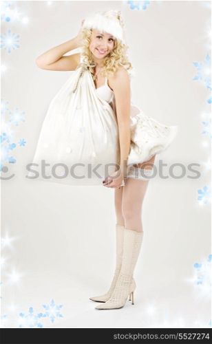 picture of sexy santa helper girl with big bag