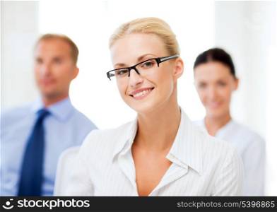 picture of smiling attractive businesswoman in office