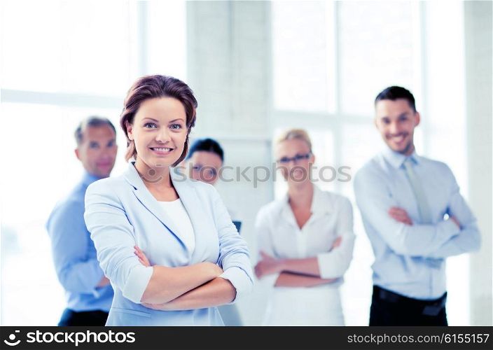 picture of smiling attractive businesswoman in office. businesswoman in office