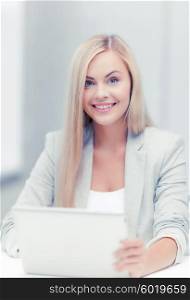 picture of smiling businesswoman using her laptop computer. businesswoman with laptop