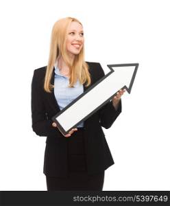 picture of smiling businesswoman with direction arrow sign