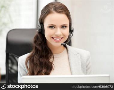 picture of smiling female helpline operator with headphones