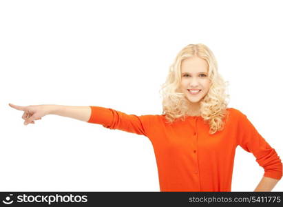 picture of smiling girl pointing her finger sideways