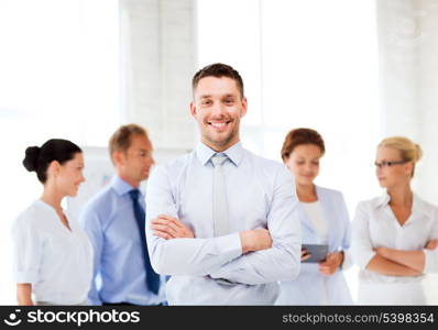 picture of smiling handsome businessman in office