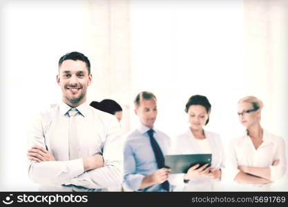 picture of smiling handsome businessman in office