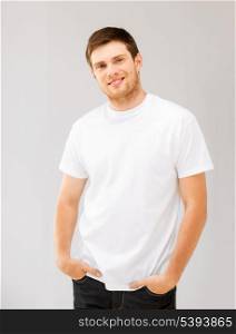 picture of smiling man in blank white t-shirt