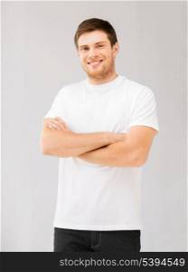 picture of smiling man in blank white t-shirt