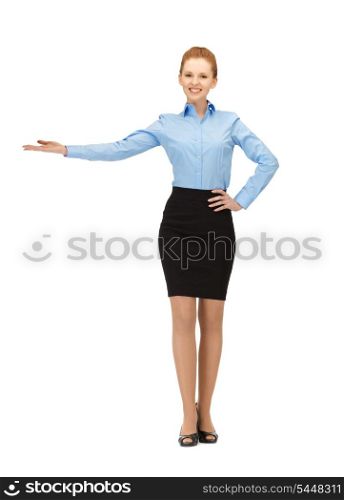 picture of smiling stewardess showing direction