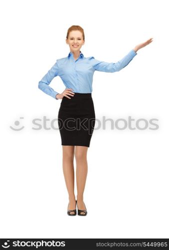 picture of smiling stewardess showing direction