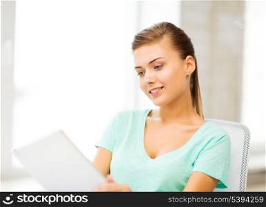 picture of smiling student girl with tablet pc