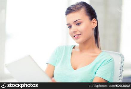 picture of smiling student girl with tablet pc. smiling student girl with tablet pc