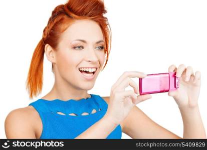 picture of smiling woman with cell phone taking photo