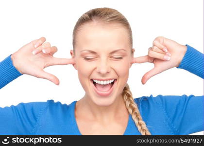 picture of smiling woman with fingers in ears