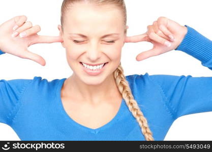 picture of smiling woman with fingers in ears