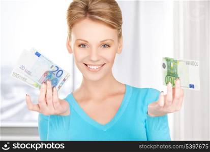 picture of smiling woman with money in hands