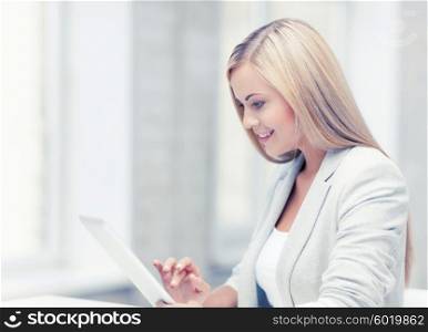 picture of smiling woman with tablet pc. woman with tablet pc