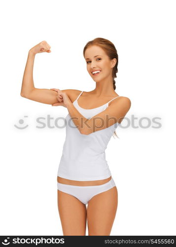 picture of sporty woman in cotton undrewear flexing her biceps