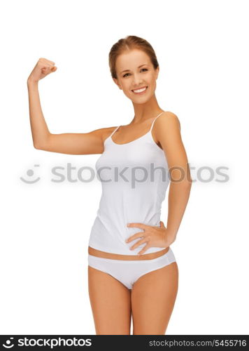 picture of sporty woman in cotton undrewear flexing her biceps