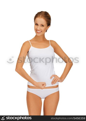 picture of sporty woman in cotton undrewear flexing her biceps