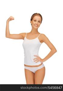 picture of sporty woman in cotton undrewear flexing her biceps