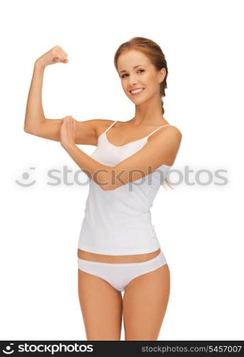 picture of sporty woman in cotton undrewear flexing her biceps