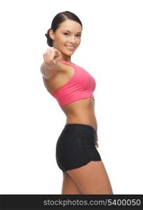 picture of sporty woman pointing her finger