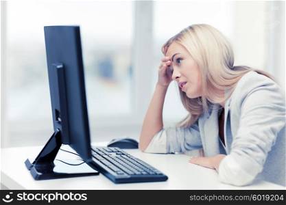 picture of stressed businesswoman with computer at work. stressed woman with computer