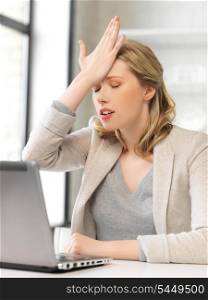 picture of stressed woman with laptop computer