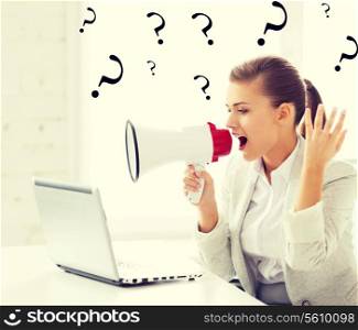picture of strict businesswoman shouting in megaphone