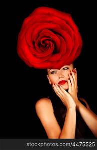 Picture of stylish young lady with big red rose on the head isolated on black background, fashionable model wearing glamorous floral hat, Valentine day, luxury lifestyle, vogue and style concept