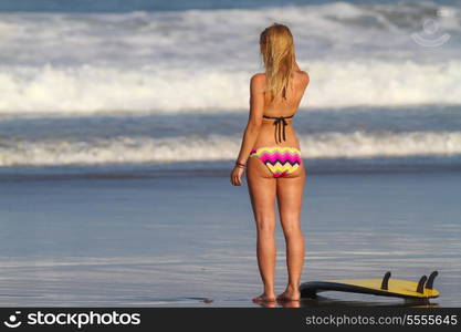 Picture of surfer girl.Bali. Indonesia.