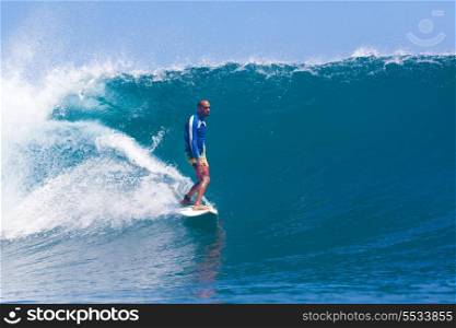 Picture of Surfing a Wave.GLand Surf Area.Indonesia.